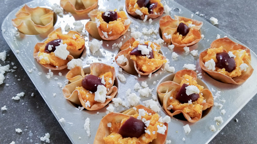 Sweet Potato Feta Wonton Cups in a muffin tin