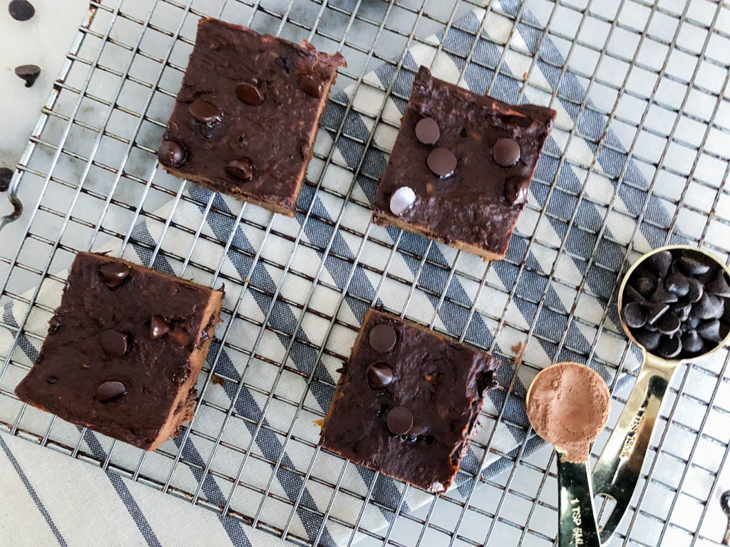 Flourless Chocolate Brownies cut into squares on a cooling rack