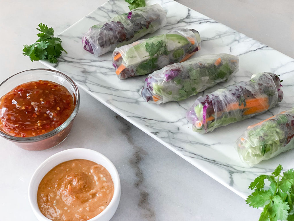 Vegetable Summer Rolls on a plate with dipping sauces