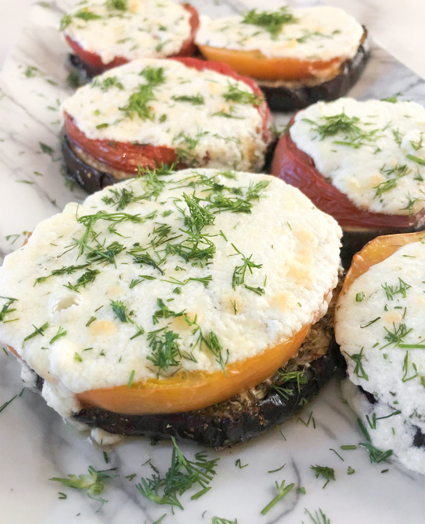 Baked Eggplant Caprese topped with fresh dill