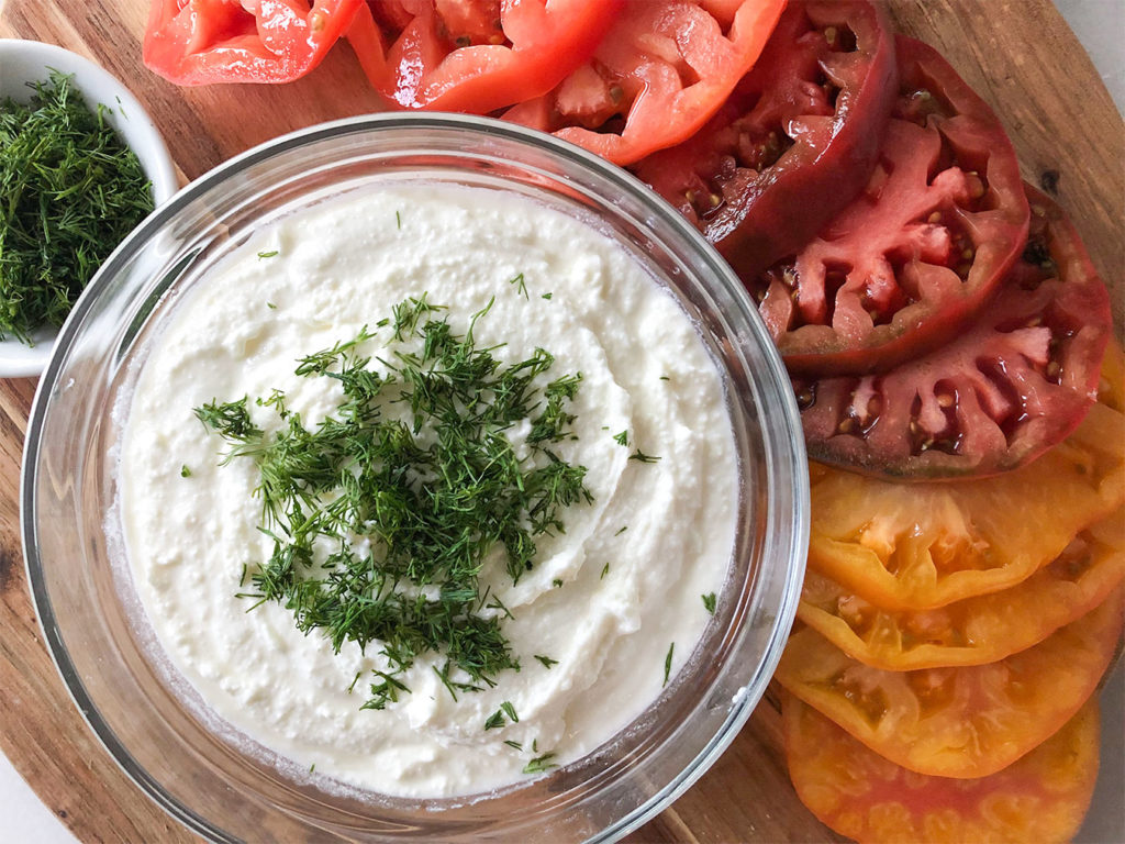 whipped feta with heirloom tomato slices