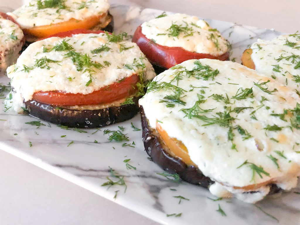 Baked Eggplant Caprese topped with fresh dill